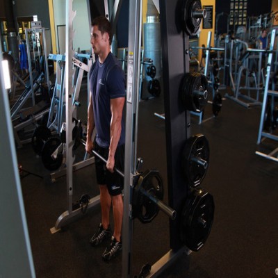 Trapezius Exercise Instructions: How to Perform Smith-Machine Shrugs