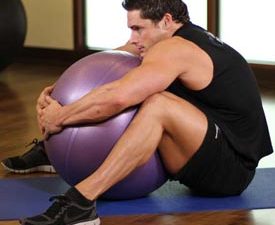 Back Exercise Instructions: How to Perform the Hug a Ball Exercise